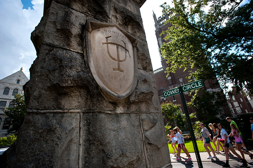 Pylon emblazoned with the Tulane shield outside Gibson Circle.